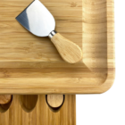 Madison bamboo cheese board with knife and three compartments.