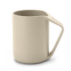 A beige mug with a unique angular handle and a smooth, minimalist design on a white background.
