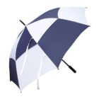 A large umbrella with alternating navy blue and white panels and a black handle.