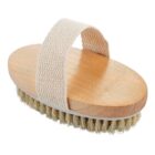Oval wooden body brush with a fabric hand strap and natural bristles.