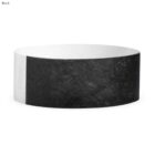 Black and white round storage bin with a textured surface.