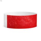 Red and white wristband with textured surface.