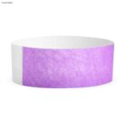 Lavender-colored paper wristband with a white edge.