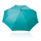 A turquoise umbrella fully opened against a white background. The fabric is taut, and the frame is unseen, creating a simple and clean appearance.