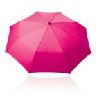 A vibrant pink umbrella open against a white background. The umbrella has a simple, classic design with a black tip at the top center and a smooth, even surface. Its reflection is subtly visible below.