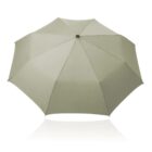 A closed view of a fully opened, light green umbrella with a straight handle, displayed against a plain white background.