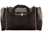 A black and gray duffle bag with dual handles and a zip closure. The bag features white piping along the seams and side compartments with zippers, designed for carrying small items.
