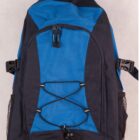 A blue and black backpack with multiple compartments, a front zipper pocket, and a bungee cord design. It has side mesh pockets and adjustable straps, positioned on a plain light background.