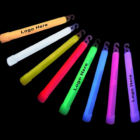Nine branded 6 glow sticks with lanyards against a black background.