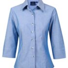 A blue, three-quarter sleeve, button-down shirt with a classic collar. The shirt is tailored with a slightly fitted design, featuring white buttons.
