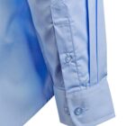 Close-up of a light blue dress shirt sleeve with a buttoned cuff and a sharp, angular cuff detail. The fabric has a smooth texture, and the stitching is visible, adding a tailored look.