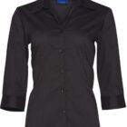 A black, long-sleeved womens button-up shirt with a collar, featuring a slightly tapered waist and no visible pattern or design. The shirt is displayed on a white background.