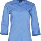 A light blue button-up blouse with three-quarter sleeves and a pointed collar. The shirt is displayed against a plain white background.