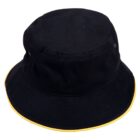 A black bucket hat with a yellow trim along the edge of the brim. The hat has a round crown and is made of a soft fabric.