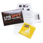 A condom package titled Live Spicy But Not Too Spicy is shown with an open informational pamphlet on condom use. The package includes a yellow condom wrapper labeled Four Seasons Condoms.
