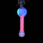 Flashing Bubble LED Wand emits pink and purple bubbles on a black backdrop.