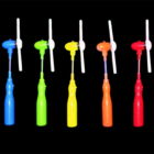 Five Flashing Colourful Windmill fans with colorful blades on a black background.
