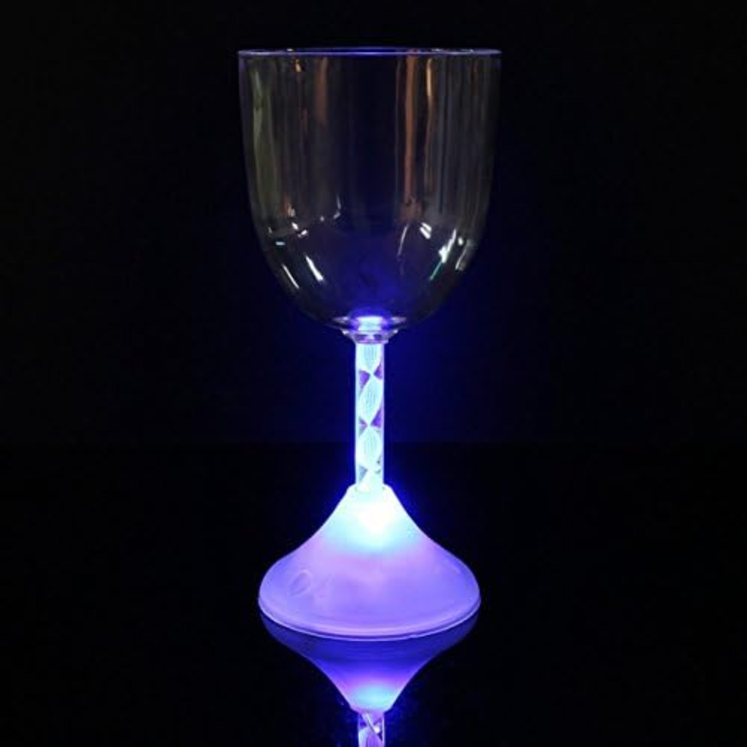 Glowing blue base Flashing Wine Glass on a black background.