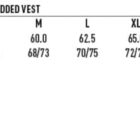 Sizing chart for a mens nylon ripstop padded vest labeled JK29. It shows modern fit sizes S to 3XL. Half chest sizes range from 57.5 to 70. Body length ranges from 66/71 to 76/81. Icons indicate wind and cold proof, and insulative features.