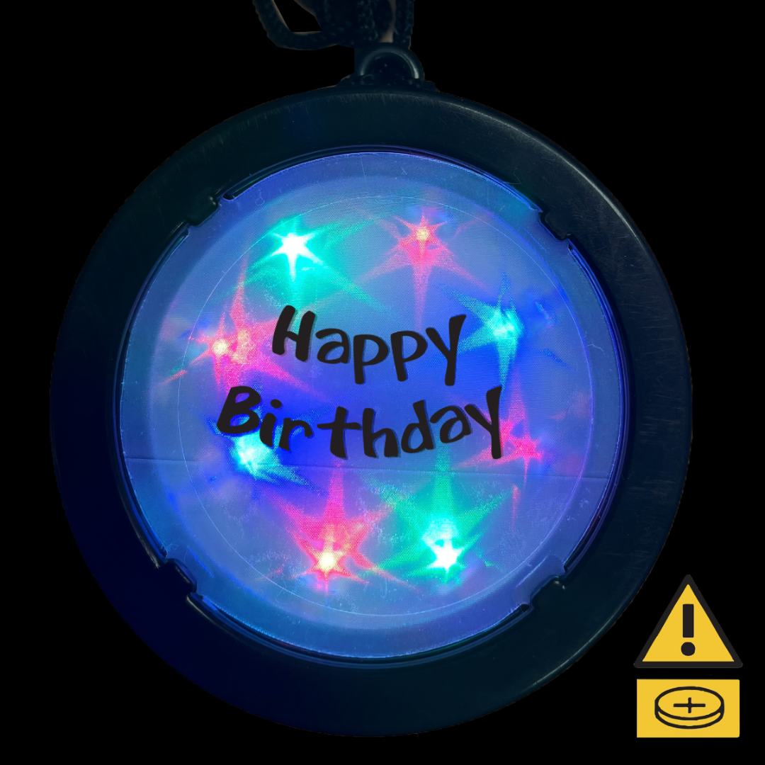 Vibrant LED colors illuminate the Birthday Medallion Necklace on a dark background.