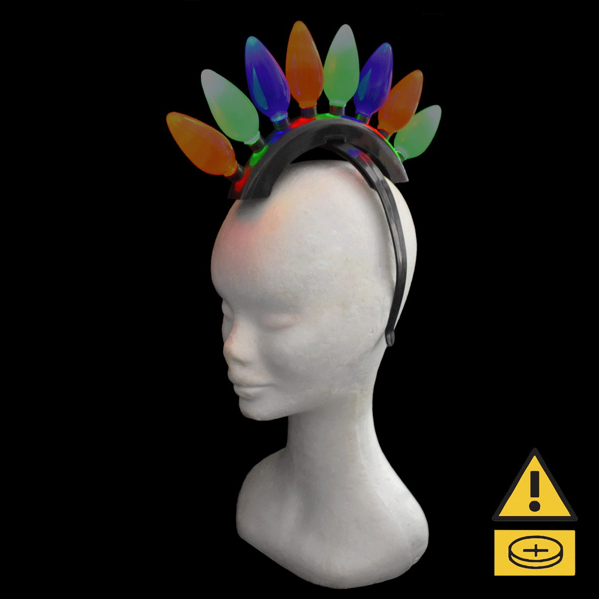 Mohawk LED Headband bust with vibrant light and nearby hazard symbol.