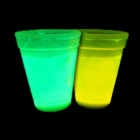 Neon Glow Cups x 4: green and yellow glow brightly on dark backgrounds.