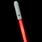 The red Night Marker Stake LED shines bright in the dark against a black background.