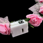 Pink Flower Crown with LED and a white switch.