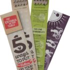 Four colorful bookmarks promoting sustainability and local food. The designs feature text about 5 ways to put Victoria on your table and Tips for Sustainability, along with graphics of vegetables, plants, and bicycles.