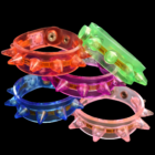 Spike Bracelet with 8 flashing LEDs, stacked in colorful, translucent piles.