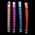 Four colorful keychain lights with a spiky bracelet featuring 8 flashing LEDs.