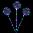Three Transparent Bobo Balloons with multicolored LEDs glow against a black background.