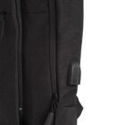 Close-up of a black backpack with zippers and a concealed USB port.