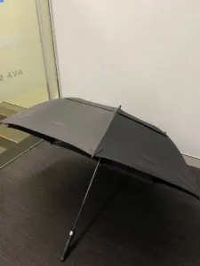 black_umbrella_on_floor