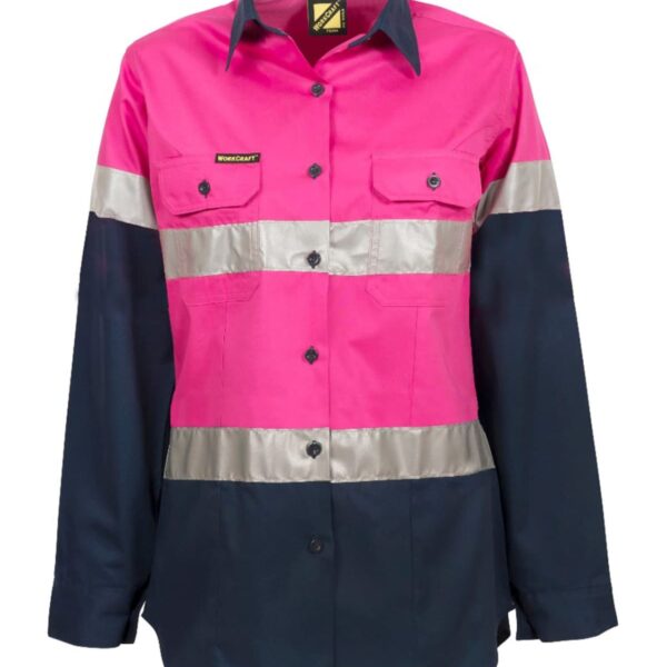 A long-sleeve work shirt with a high-visibility design, featuring bright pink on the upper half and dark blue on the lower half. It has silver reflective bands across the chest, arms, and back, and front buttoned pockets.