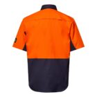 A short-sleeved, button-up work shirt with a bright orange top half and a dark blue bottom half. There is a small logo patch on the left sleeve. The shirt is displayed against a white background.