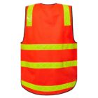 Bright orange safety vest with reflective yellow-green stripes across the chest and shoulders, viewed from the back. The stripes feature a crisscross pattern, enhancing visibility. The vest is designed for safety purposes.