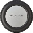 Round black and silver object with Your Logo and Slogan printed in the center.
