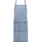A blue denim apron with adjustable neck strap and waist ties. It features a large front pocket that is divided into sections. The fabric has a casual, textured look.