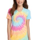Person wearing a colorful tie-dye T-shirt with a spiral pattern, smiling.