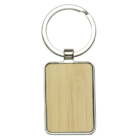 A rectangular wooden keychain with a metal frame and a circular metal keyring attached on top. The wood has a smooth, light grain finish.