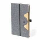 Gray fabric notebook with a wooden accent, elastic band closure, and pen holder.