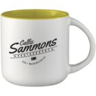 A white coffee mug with a yellow interior is shown. The mug features the text Callie Sammons Photography alongside a small camera icon. It also includes USA, Washington DC written below the main text.