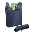 Blue reusable tote bag with magazines and a bottle, next to a folded version with a carabiner.
