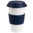 Reusable white travel coffee cup with a navy blue lid and grip sleeve.