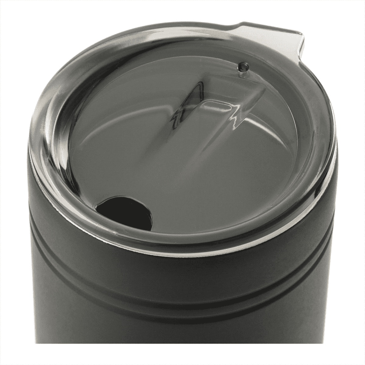 A close-up of a stainless steel travel mug with a transparent plastic lid. The lid features a small drinking hole and a larger sip opening, designed to prevent spills. The mug has a sleek, matte finish with two subtle horizontal ridges.