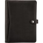 A closed black leather journal with a sleek design and a button clasp. The cover has a smooth texture with a vertical flap overlapping the front, adding a touch of sophistication.