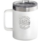 A white mug with a handle features a silver logo of trees and mountains, labeled Ghordata Nature Reservoir. The mug has a shiny metal rim and a clear, lift-off lid.