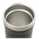 A close-up view of a stainless steel travel mugs open top, showing the smooth and shiny interior and rim. The mugs exterior is a matte dark gray color. The image focuses on the circular opening and rim detail.