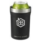 A black Arctic Zone can cooler holds a green beverage can. The cooler features a silver rim and a logo with a house icon and BB letters.